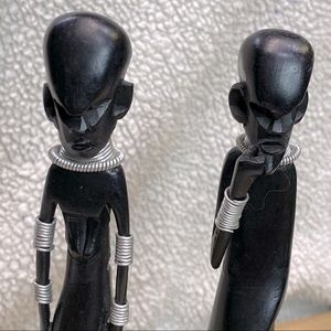 Hand carved from Kenya (Man, woman, child)